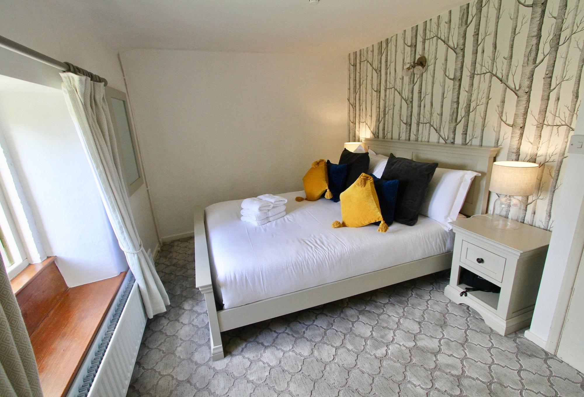 Hotel Ashfield House à Grassington Extérieur photo A bedroom at The Old Inn