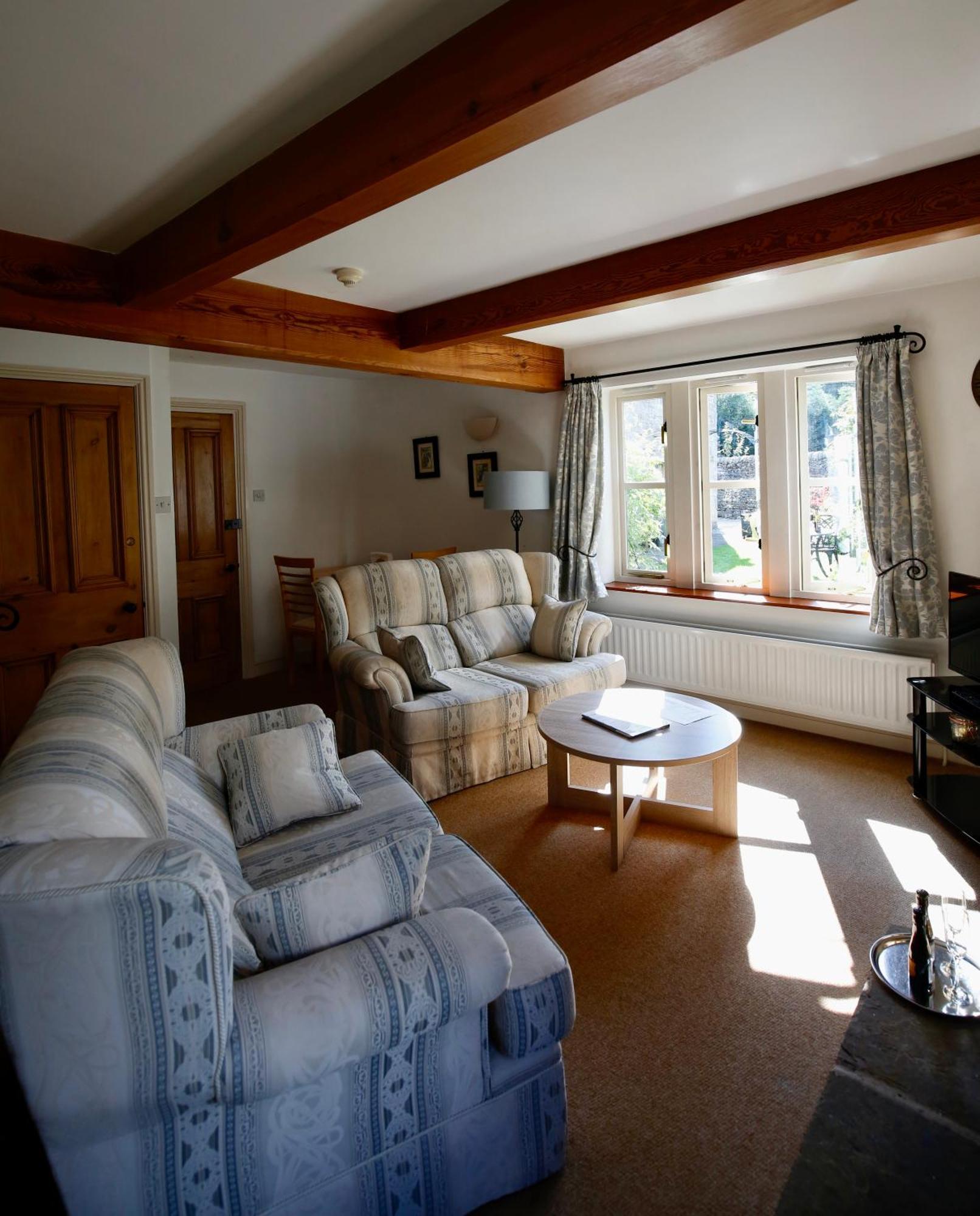 Hotel Ashfield House à Grassington Chambre photo The living room at The Old School House
