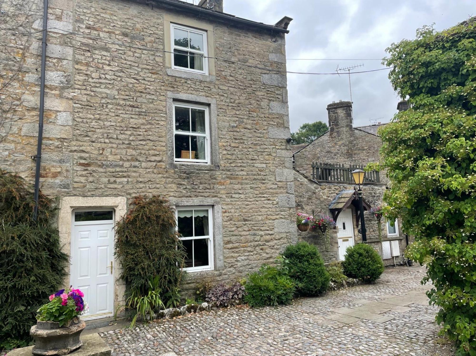 Hotel Ashfield House à Grassington Chambre photo The old post office